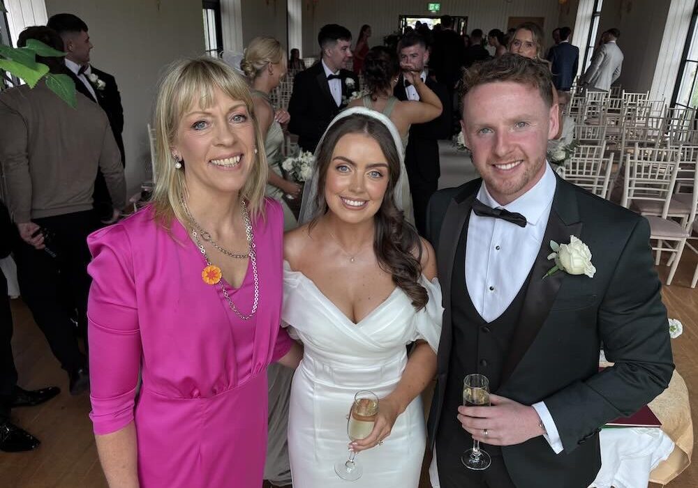 Rebecca with wedding couple