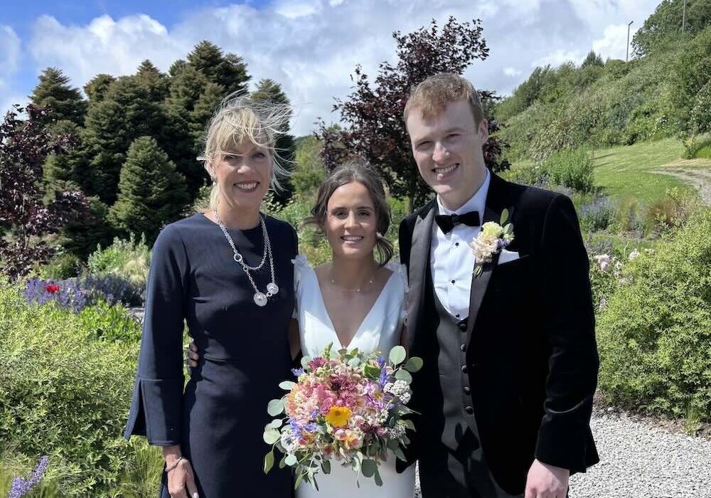 Minister Rebecca with wedding couple